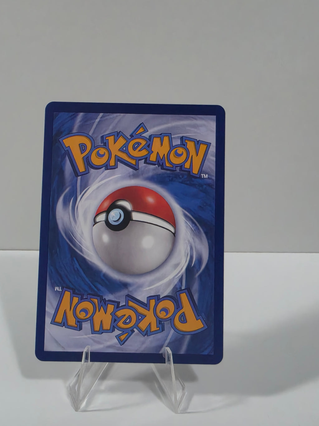 Pokémon trading card with a Poké Ball design on a white background