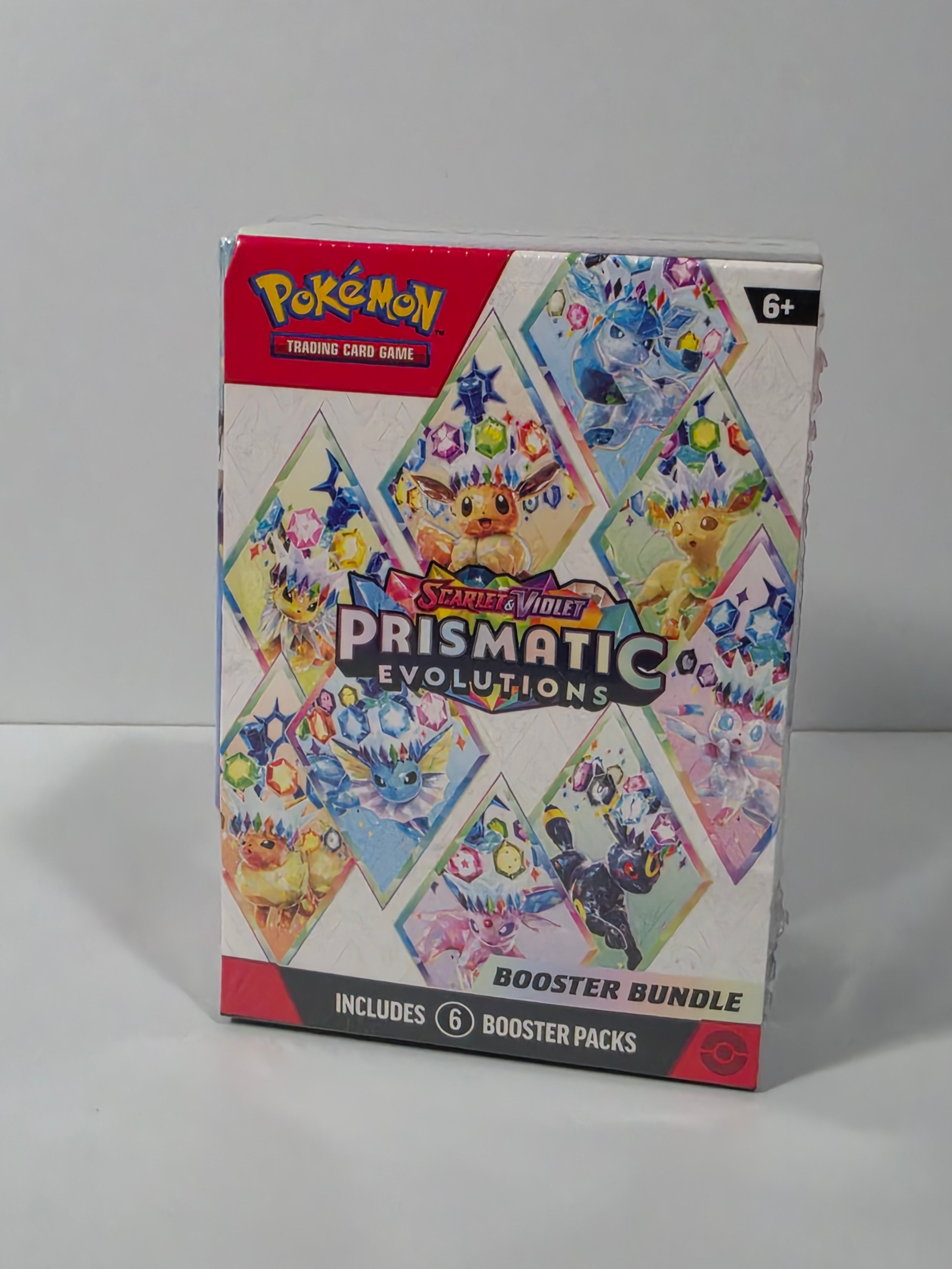Pokémon Prismatic Evolutions trading card game booster bundle on a white background