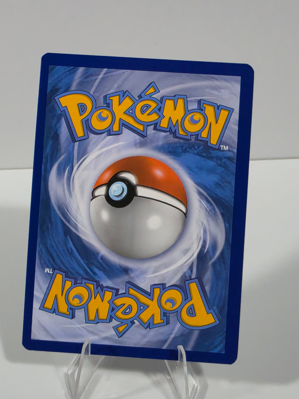 Pokémon trading card with a Poké Ball design on a white background