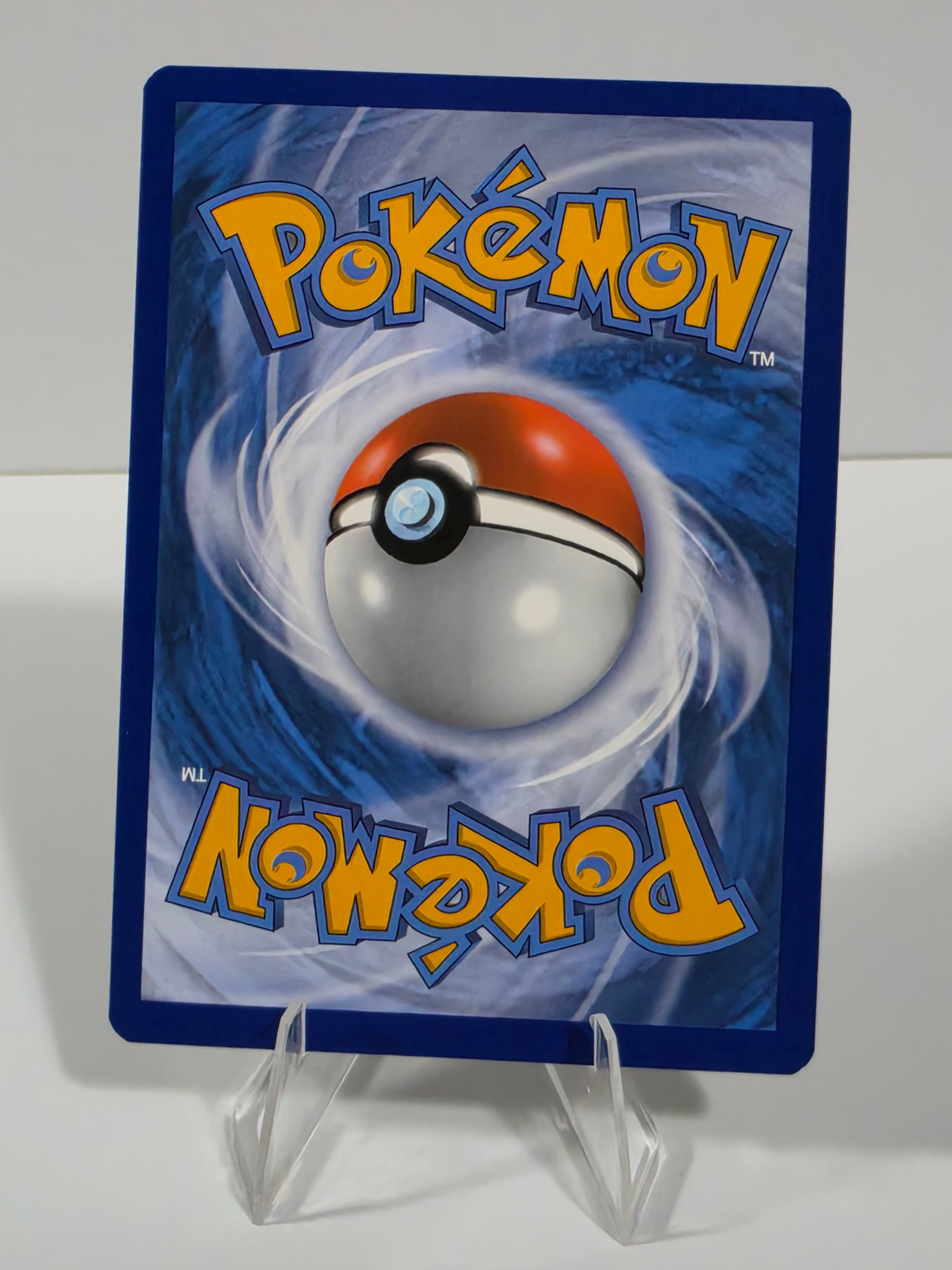 Pokémon trading card with a Poké Ball design on a white background