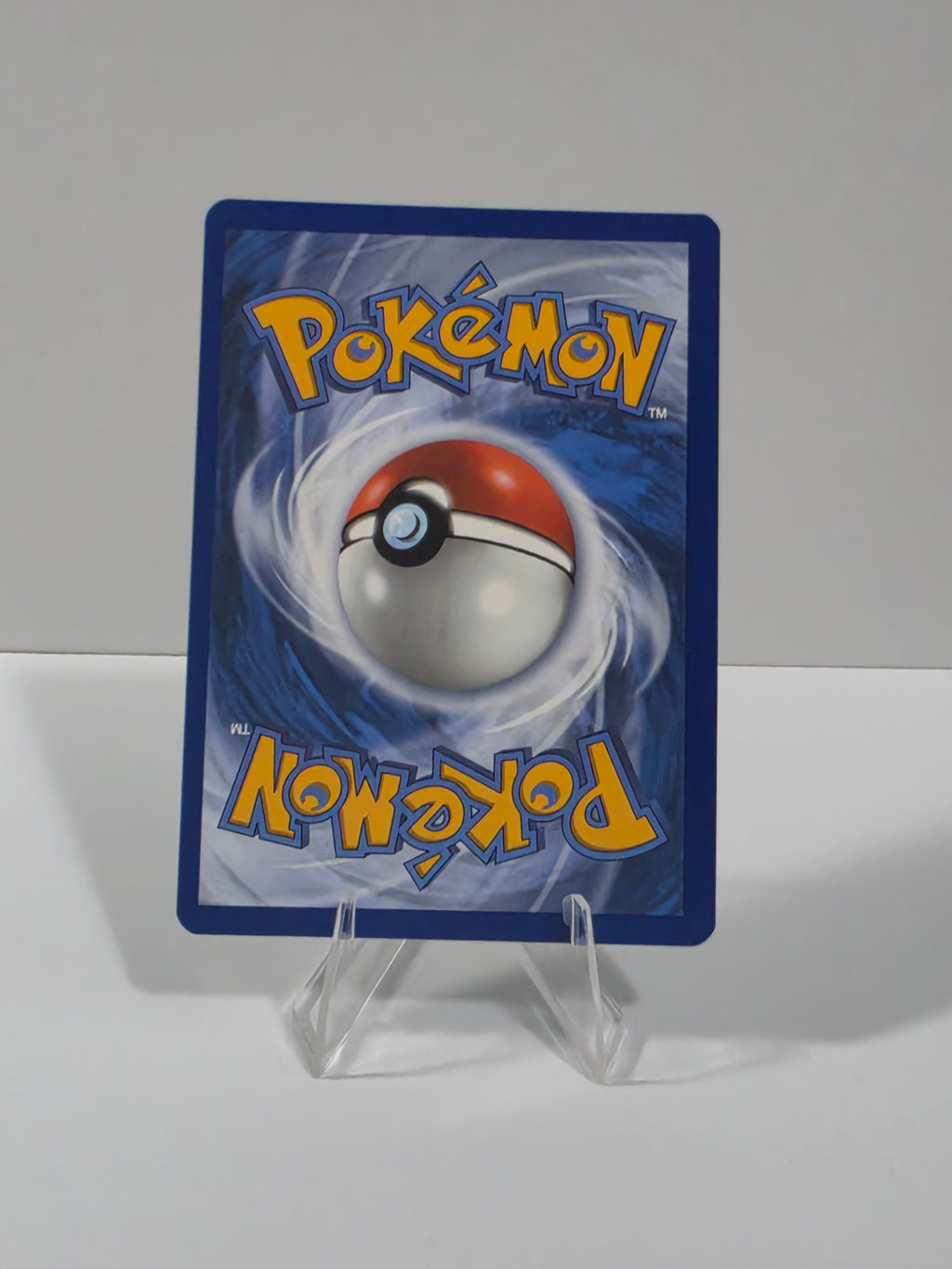 Pokémon trading card with a Poké Ball design on a white background