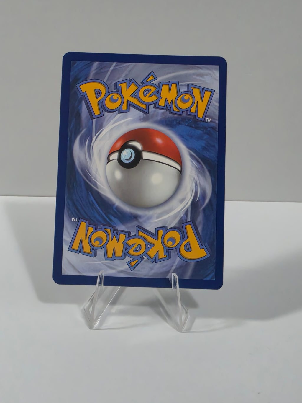 Pokémon trading card with a Poké Ball design on a white background